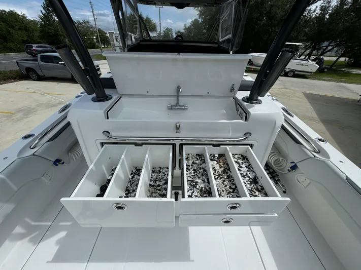  Yacht Photos Pics 2022 Nor-Tech 392 Super Fish boat with open tackle storage drawers.