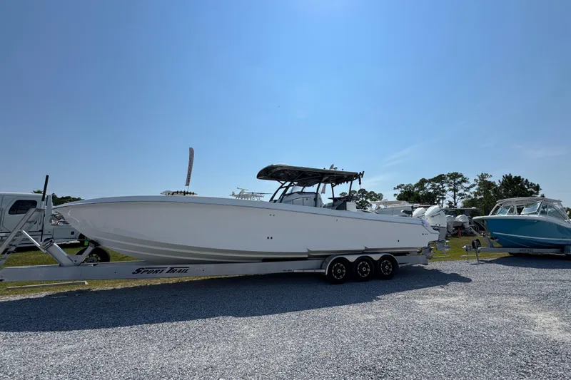  Yacht Photos Pics 2022 Nor-Tech 392 Super Fish boat on trailer under clear blue sky.