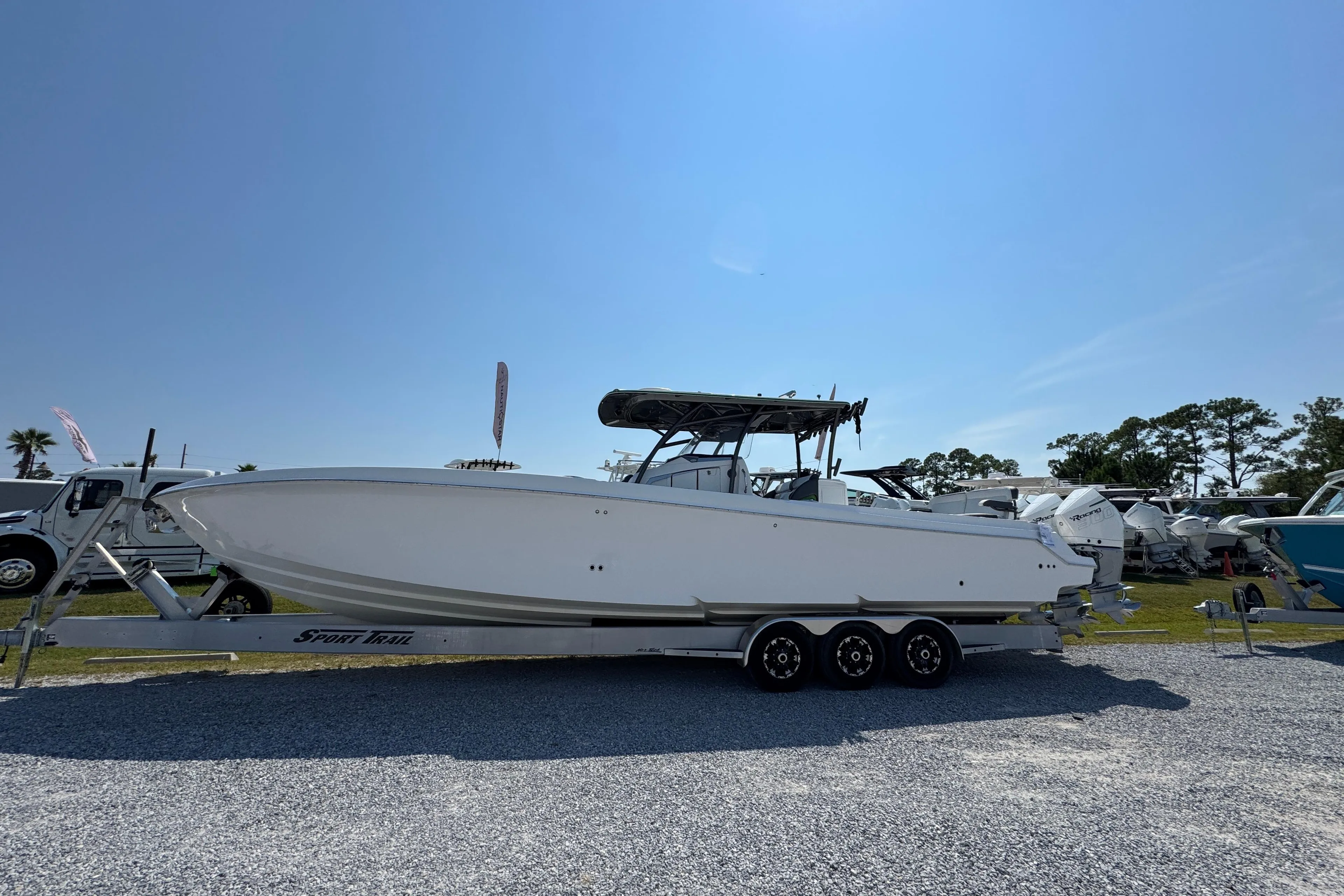 2022 Nor-Tech 392 Super Fish boat on trailer under clear blue sky.