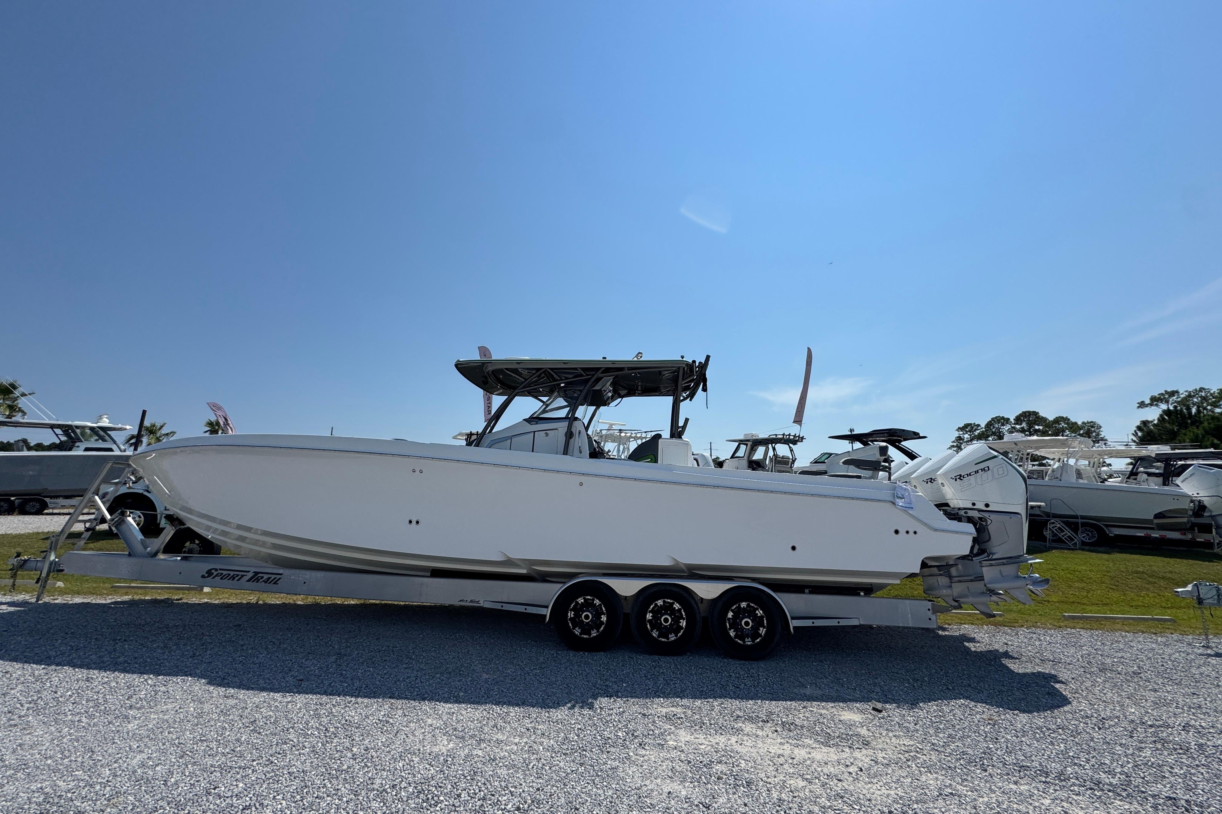 2022 Nor-Tech 392 Super Fish boat on trailer under clear blue sky.