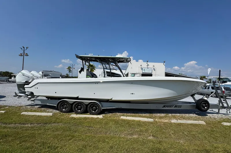  Yacht Photos Pics 2022 Nor-Tech 392 Super Fish boat on trailer, parked outdoors under clear sky.