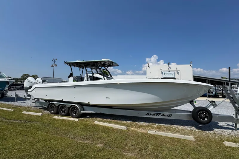  Yacht Photos Pics 2022 Nor-Tech 392 Super Fish boat on trailer under clear blue sky.