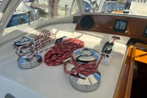 Symphony V Yacht Photos Pics Hinckley Sou'wester 52 sailboat cockpit with winches and ropes, 1999 model.