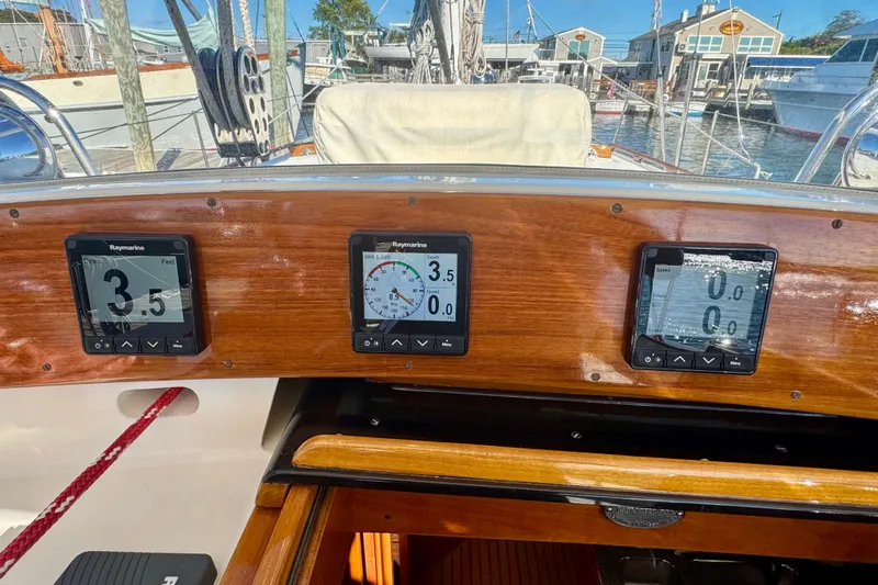 Symphony V Yacht Photos Pics Hinckley Sou'wester 52 yacht cockpit with Raymarine displays, showcasing navigation instruments.