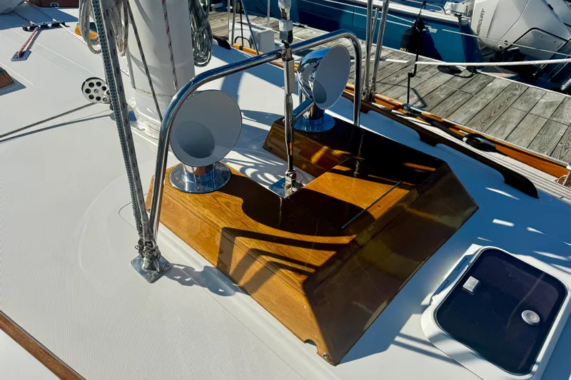 Symphony V Yacht Photos Pics Deck of 1999 Hinckley Sou'wester 52 sailboat with polished wood and metal fittings.