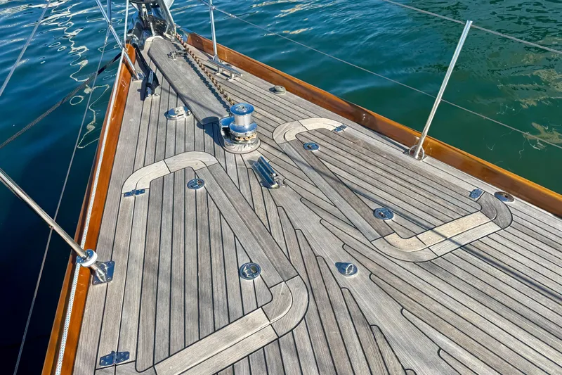 Symphony V Yacht Photos Pics Deck of 1999 Hinckley Sou'wester 52 sailboat with teak wood finish and metal fittings.