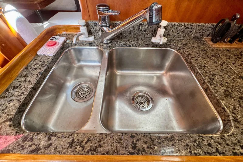 Symphony V Yacht Photos Pics Stainless steel double sink on Hinckley Sou'wester 52 yacht, 1999 model.