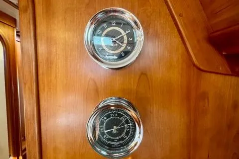 Symphony V Yacht Photos Pics Hinckley Sou'wester 52 yacht interior with classic clock and barometer, 1999 model.