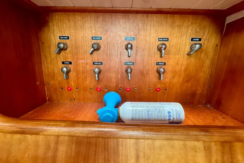 Symphony V Yacht Photos Pics Control panel of 1999 Hinckley Sou'wester 52 sailboat with switches and air horn.