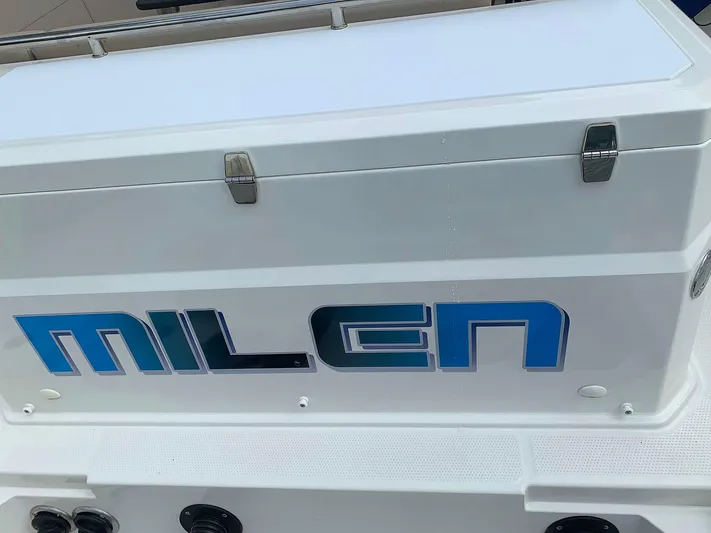  Yacht Photos Pics Hussar Skamander 920 Explorer MAX 2022 boat with "MILEN" branding on white surface.