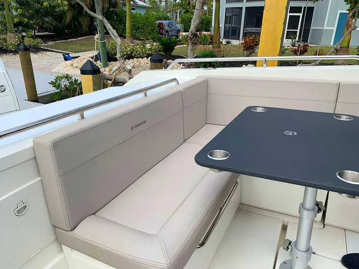  Yacht Photos Pics Hussar Skamander 920 Explorer MAX 2022 boat seating area with table.