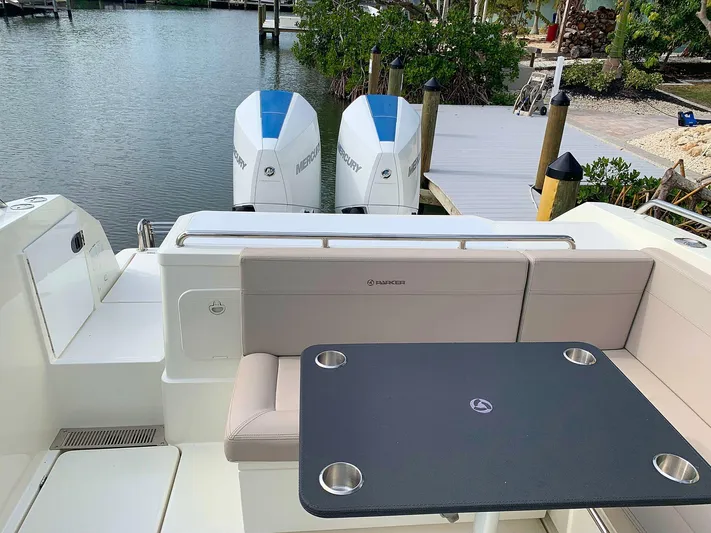  Yacht Photos Pics Hussar Skamander 920 Explorer MAX 2022 boat with dual Mercury engines and seating area.