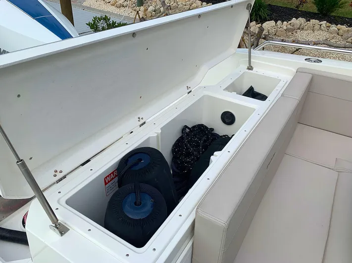  Yacht Photos Pics Open storage compartment on 2022 Hussar Skamander 920 Explorer MAX boat.