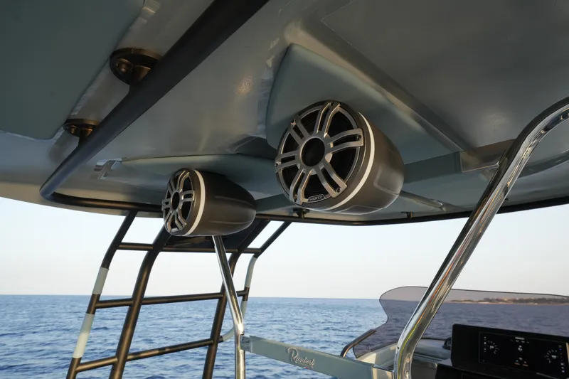  Yacht Photos Pics 2025 Ranieri Cayman 33 Executive boat speakers and ladder with ocean view.