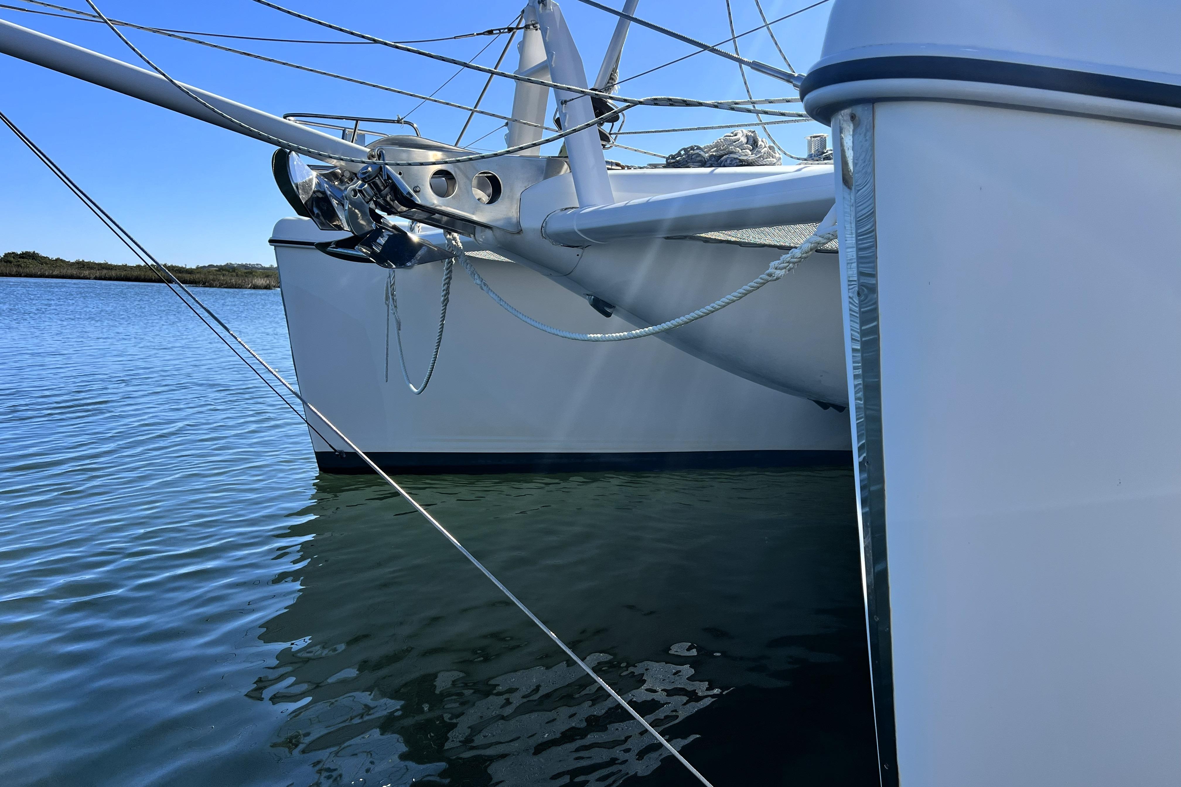 Sailing catamaran Privilege 495, 2011 model, anchored on calm water.