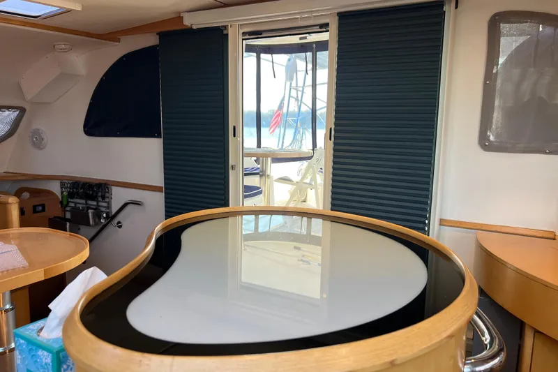 Evolution Yacht Photos Pics Interior of 2011 Privilege 495 yacht with modern furnishings and sliding door.