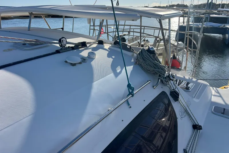 Evolution Yacht Photos Pics Sailing yacht Privilege 495, 2011 model, docked at marina with clear skies.