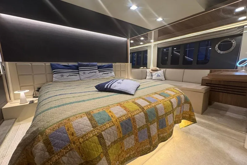  Yacht Photos Pics Luxurious bedroom interior of 2017 Absolute 60 Fly yacht with elegant bedding and modern design.