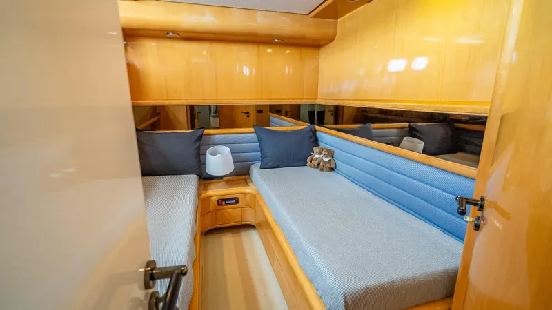 Bramamare Yacht Photos Pics Twin cabin with wooden interior on 1995 Sanlorenzo 62 yacht.