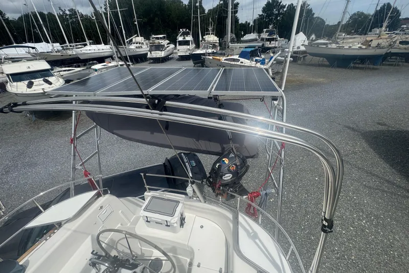 True Love Yacht Photos Pics 2005 Catalina Morgan 440 DS sailboat with solar panels in a marina.