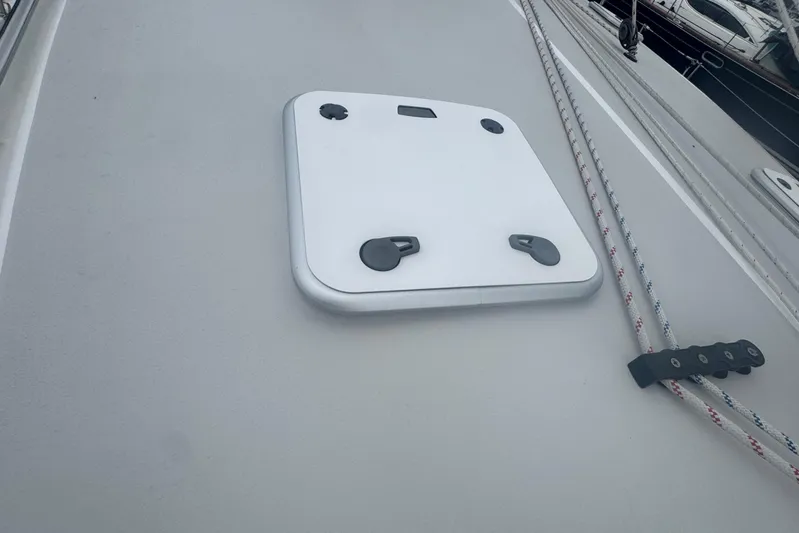 True Love Yacht Photos Pics Deck hatch on a 2005 Catalina Morgan 440 DS sailboat with visible ropes.