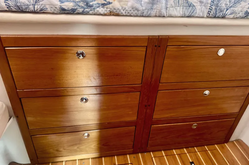 True Love Yacht Photos Pics Wooden drawers in a 2005 Catalina Morgan 440 DS yacht interior.