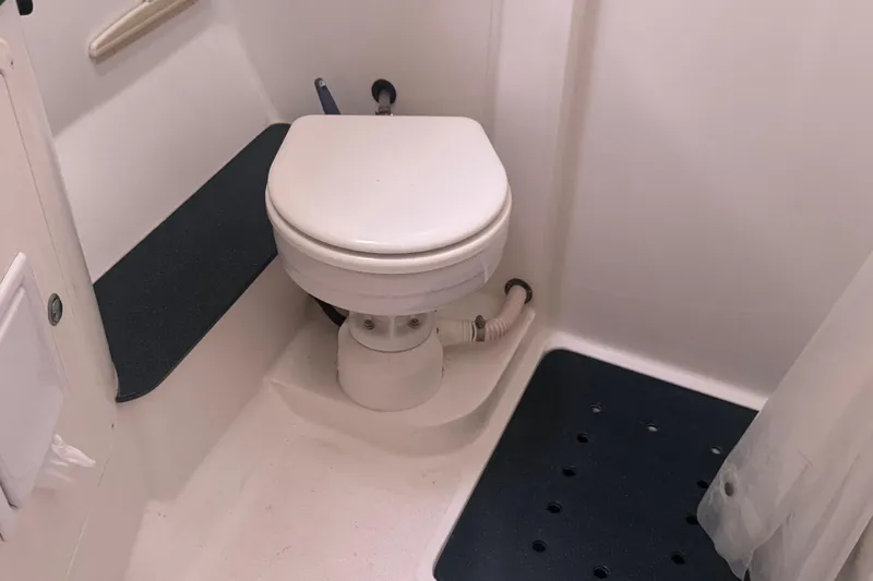 True Love Yacht Photos Pics 2005 Catalina Morgan 440 DS boat bathroom with toilet and shower area.