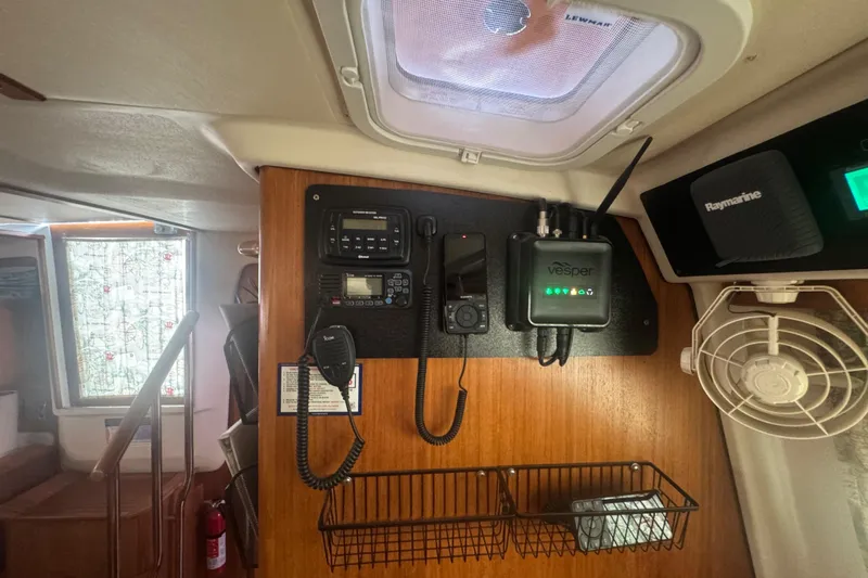 True Love Yacht Photos Pics Navigation equipment inside a 2005 Catalina Morgan 440 DS sailboat cabin.