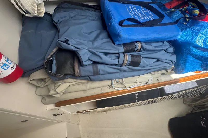 True Love Yacht Photos Pics Storage area in a 2005 Catalina Morgan 440 DS with gear and bags.