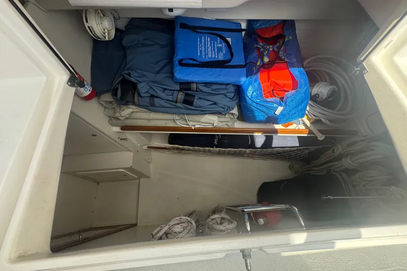 True Love Yacht Photos Pics Storage compartment of 2005 Catalina Morgan 440 DS sailboat with gear and equipment.