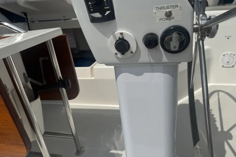 True Love Yacht Photos Pics Control panel of a 2005 Catalina Morgan 440 DS sailboat, featuring thruster power controls.