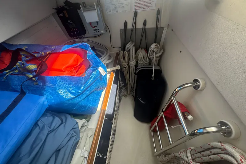 True Love Yacht Photos Pics Storage area in a 2005 Catalina Morgan 440 DS sailboat with bags and ropes.