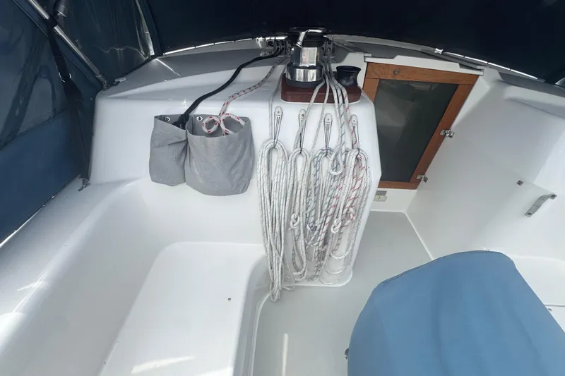 True Love Yacht Photos Pics 2005 Catalina Morgan 440 DS sailboat cockpit with ropes and storage bags.