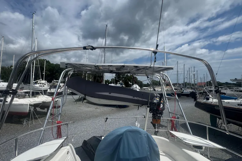 True Love Yacht Photos Pics 2005 Catalina Morgan 440 DS sailboat in a marina with overcast skies.