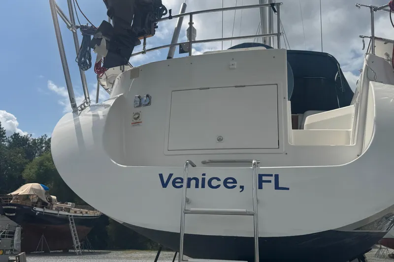 True Love Yacht Photos Pics 2005 Catalina Morgan 440 DS sailboat docked in Venice, FL, with clear sky background.