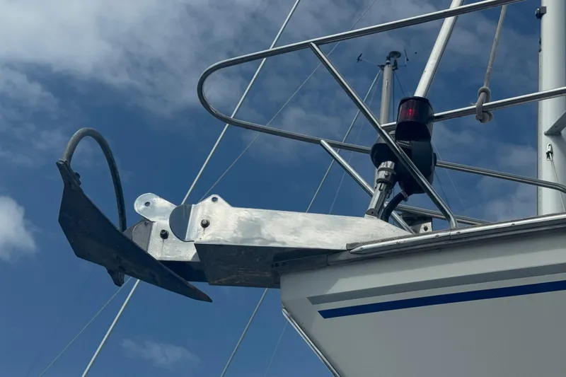 True Love Yacht Photos Pics Bow of 2005 Catalina Morgan 440 DS sailboat with anchor and navigation light.