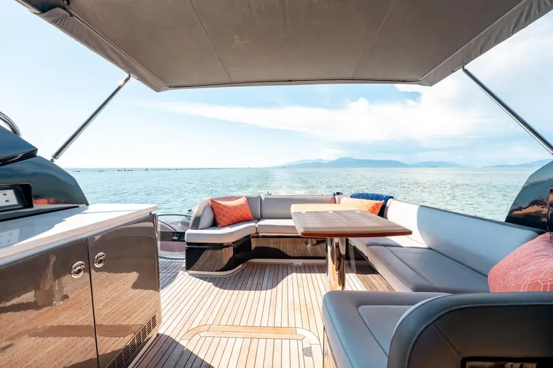  Yacht Photos Pics Luxurious 2015 Princess V48 yacht interior with elegant seating and ocean view.