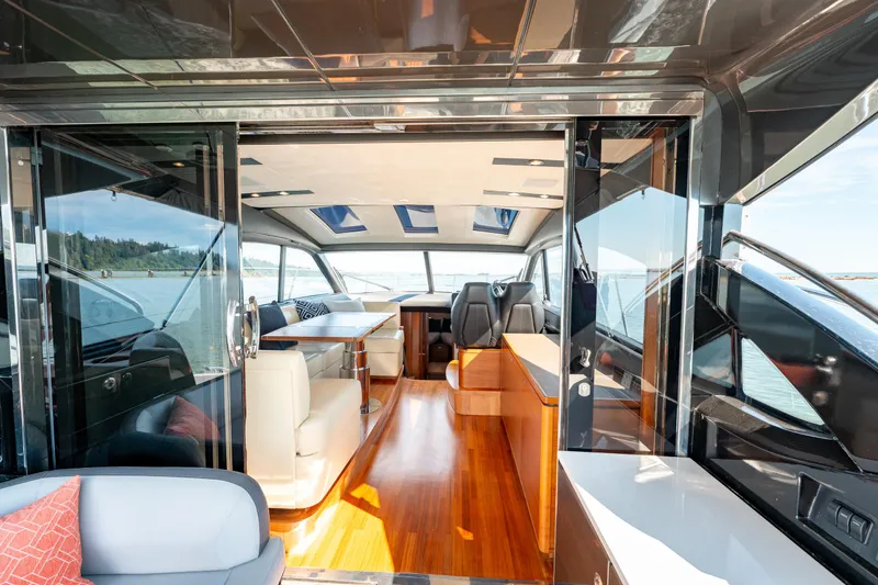  Yacht Photos Pics Luxurious interior of 2015 Princess V48 yacht with sleek design and modern furnishings.