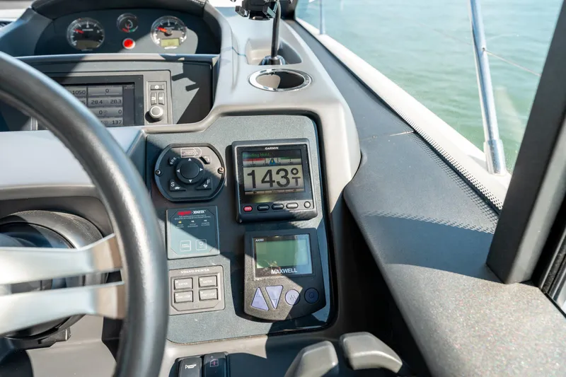  Yacht Photos Pics Control panel of a 2015 Princess V48 yacht with navigation instruments.