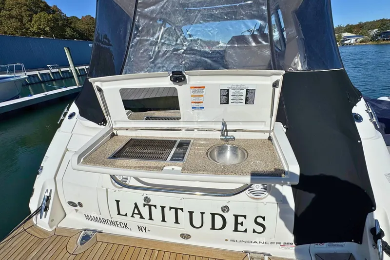  Yacht Photos Pics 2017 Sea Ray Sundancer 350 Coupe with outdoor kitchenette at marina.