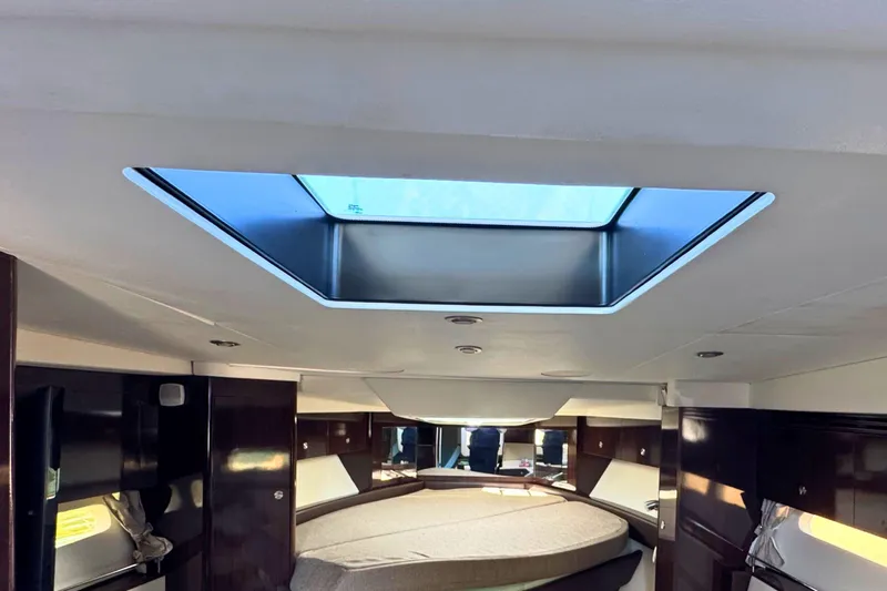  Yacht Photos Pics Interior of 2017 Sea Ray Sundancer 350 Coupe with skylight and luxurious cabin.