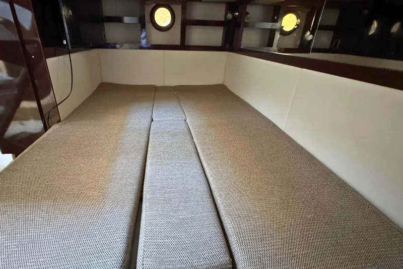  Yacht Photos Pics Interior cabin of 2017 Sea Ray Sundancer 350 Coupe with beige upholstery.