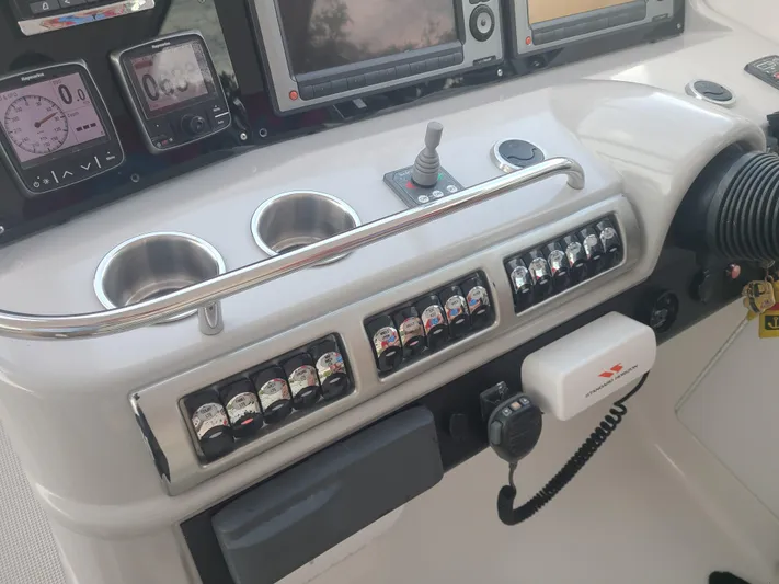  Yacht Photos Pics Control panel of a 2007 Formula 45 Yacht with navigation instruments and switches.