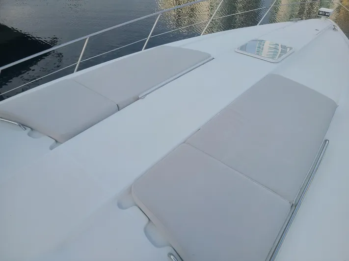  Yacht Photos Pics 2007 Formula 45 Yacht with sunbathing cushions on deck.