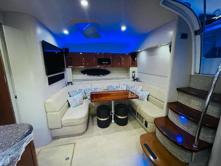  Yacht Photos Pics Interior of a 2007 Formula 45 Yacht with modern seating and blue ambient lighting.