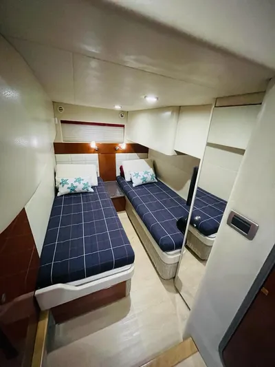  Yacht Photos Pics 2007 Formula 45 Yacht cabin with twin beds and modern interior design.
