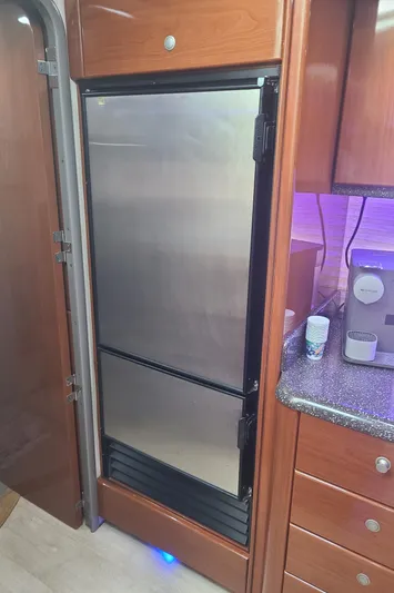  Yacht Photos Pics Stainless steel refrigerator in 2007 Formula 45 Yacht kitchen.