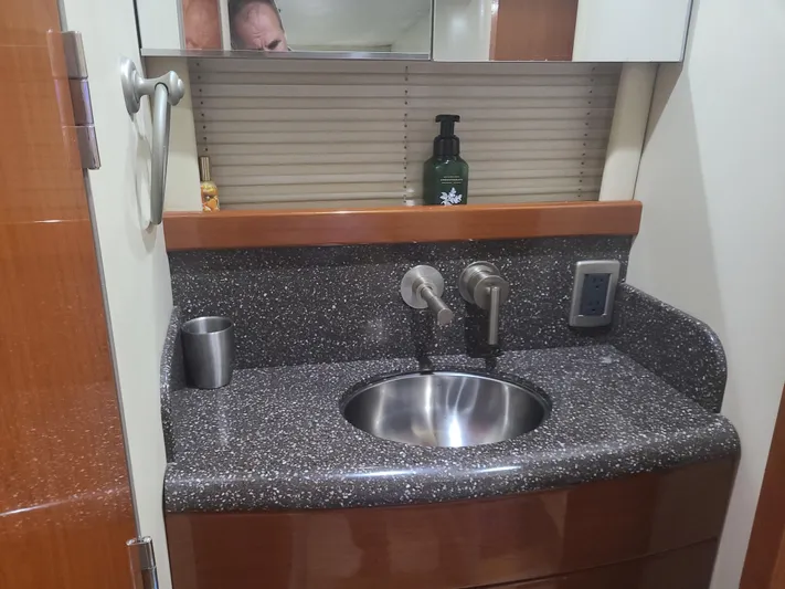  Yacht Photos Pics Bathroom sink area in a 2007 Formula 45 Yacht with granite countertop.