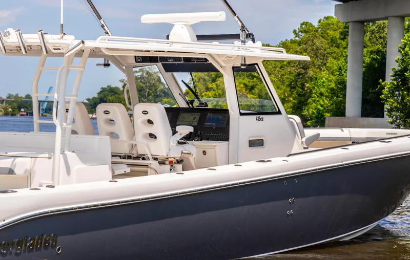  Yacht Photos Pics 2018 Everglades 435 Center Console boat on water, featuring sleek design and modern amenities.