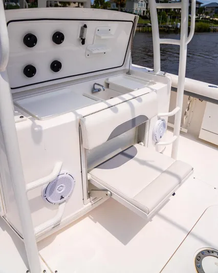  Yacht Photos Pics 2018 Everglades 435 Center Console boat interior with seating and control panel.